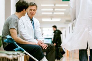 discussing injury with doctor