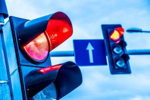 driver failing to stop and running a red light