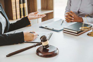 injured accident victim meeting with attorney 