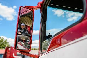 red commercial truck sideview mirror
