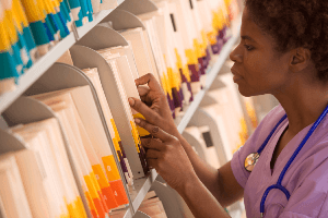 nursing looking through medical records