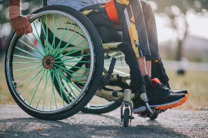 man in wheelchair outside