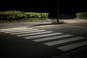 empty crosswalk at nighttime
