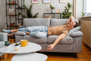 tired man on couch