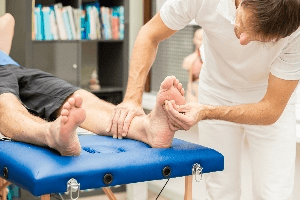 doctor testing patient for neuropathy